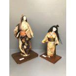 2 x 1950s Japanese dolls with stands dressed in traditional costumes with porcelain heads & hands 37