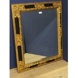 Gilt & black framed mirror with bevelled glass 67 x 78 cm)