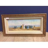 Gilt framed oil painting depicting a Victorian beach gathering 16 x 45 cm