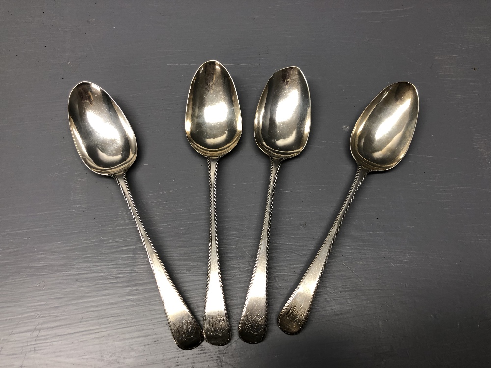 Set of 4 C18th silver dessert spoons with bright cut decoration, London 1773 makers stamp 'ST' 182g