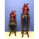 2 Resin Chinese immortals (41 cm) on hardwood stands with marble panels 92 & 61 cm & a small