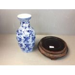 Chinese blue and white vase, & a hardwood stand