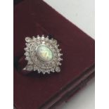 Silver cubic zirconia & central opal panelled dress ring