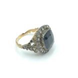 C19th Sapphire & diamond ring. Central cushion cut sapphire 12mm x 10 mm (approx) surrounded by 20