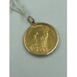Victorian gold sovereign 1888 in a 9ct bezel mount on a 9ct gold chain. Chain 6.7g sovereign 8.7g