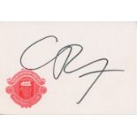 Manchester United. A white card with Manchester United emblem signed by Christiano Ronaldo, sold