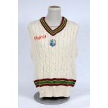 West Indies sleeveless white Test sweater, by Admiral, with West Indies emblem in shield to centre