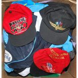 Sporting clothing. Box comprising a mixed selection of clothing including tops, shirts, caps,