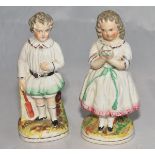 Staffordshire cricketing figures. Pair of early mid 19th Century Staffordshire figures of a young