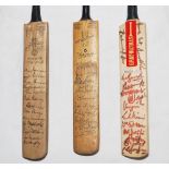 Australia 1956. Miniature 'Gray Nicholls Crusader' cricket bat signed to the face by thirteen