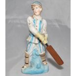 Continental coloured porcelain figure of a boy cricketer holding a wooden cricket bat. Figure