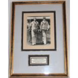 Len Hutton and Herbert Sutcliffe. Original mono photograph of Hutton and Sutcliffe walking out to