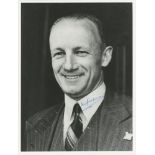 Don Bradman. Mono library photograph of Bradman, head and shoulders wearing suit and tie. Signed