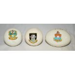 Crested football. Two crested china football with panels and lace holes with colour emblem for '