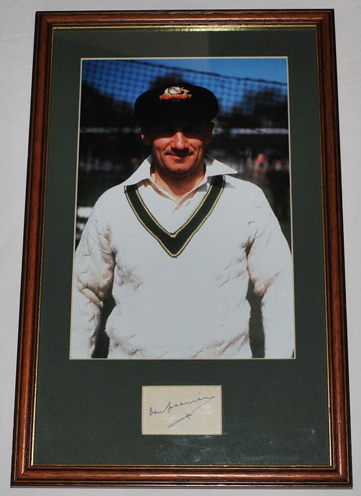Don Bradman 1948. Nice signature in ink of Don Bradman on small page mounted below a colour
