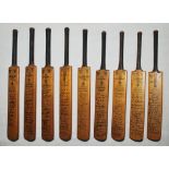 Gray Nicolls 1948-1959. Collection of nine miniature bats, 11.5" long. Each with printed facsimile