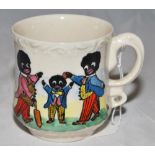 Cricket mug. A hand painted china mug by Joan Allen featuring three golliwogs playing cricket, one