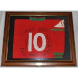 Rugby Union. 'Magnificent Seven'. Red Welsh rugby union 'number 10' shirt, signed by seven iconic