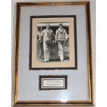 Len Hutton and Herbert Sutcliffe. Original mono photograph of Hutton and Sutcliffe walking out to