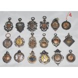 Cricket medals 1890s-1940s. Eighteen hallmarked silver medals, the majority with gilt emblems to