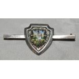 Silver metal tie pin. Hallmarked silver tie pin with shield to centre with elaborate enamel image of
