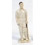 'Peter May' Surrey & England 1950-1963. A glazed pottery figure of Peter May standing in batting