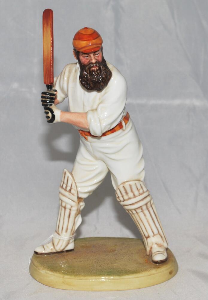 W.G. Grace. Royal Doulton china figure of W.G. Grace. Grace is depicted in batting mode wearing M.