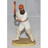 W.G. Grace. Royal Doulton china figure of W.G. Grace. Grace is depicted in batting mode wearing M.