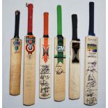 Test cricketers 1980s-2000s. Six miniature cricket bats signed by an assortment of Test players.