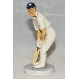 'A Yorkshire batsman'. A glazed pottery figure of batsman modelled full length, wearing Yorkshire