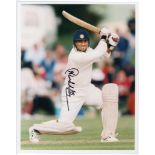 Signed cricket photographs 1990s. White file comprising sixteen colour photographs of cricketers,