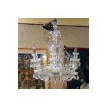 Mid Century Maria Theresa Style 8 Light Cut Crystal Chandelier with Hanging Prism. Missing two arms