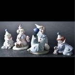 Four Porcelain Figurines