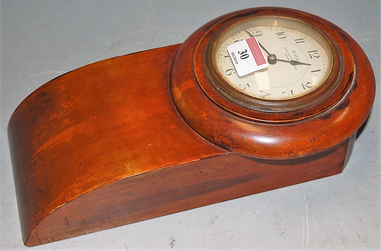 An early 20th century miniature mahogany cased droptrunk wall clock, having convex enamel dial