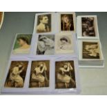 A quantity of postcards in modern albums, to include theatrical and royal interest