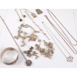A quantity of mixed silver and white metal jewellery to include two charm bracelets, a silver buckle