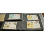 A box containing various albums of first day covers, to include Milestones of Flight, Famous