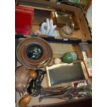Two boxes of miscellaneous items to include carved ebonised bust, wooden elephant, travel games,
