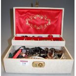 A box of miscellaneous costume jewellery to include various bead necklaces, diamante brooch, etc