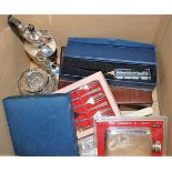 A box of miscellaneous silver plated wares to include pocket hip flask, boxed dessert forks, hot