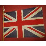 A Vintage Cotton Union Flag on pole