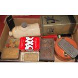 A box of miscellaneous items to include stoneware foot warmer and lithograph printed tins etc.