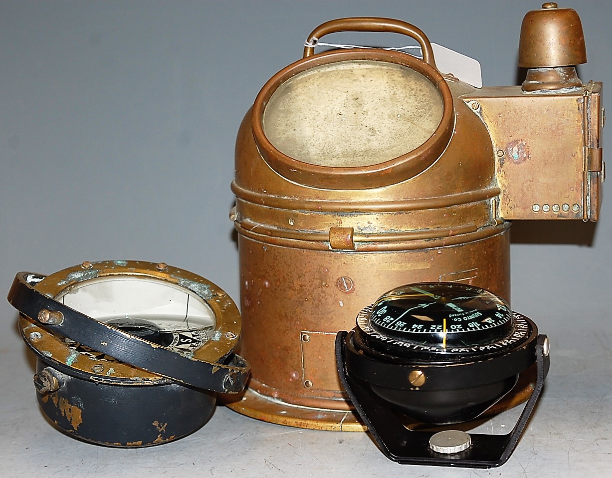 A brass cased ships compass mounted on gimbel signed Lilley & Reynolds Ltd. London EC3, together