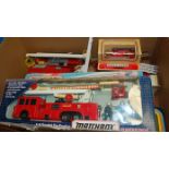 A single box of boxed and loose diecast fire engines to include Matchbox, K39 Snorkel fire engine,