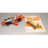 A loose Corgi Toys model of Chitty Chitty Bang Bang with both tail and front fins and all four