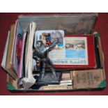 A box of miscellaneous items to include boxed Lott's bricks, Beatrix Potter books etc