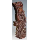 A large mid 20th century carved wooden model of a sage (with losses), height 52cm