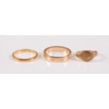 A 22ct wedding band (2.2g), a '14kt' wedding band (4.3g) and a 9ct ring (0.9g), (3)
