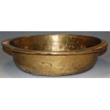 A large early 20th century brass shallow bowl, dia. 47cm