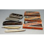 Three cased sets of Rolls Razors and others